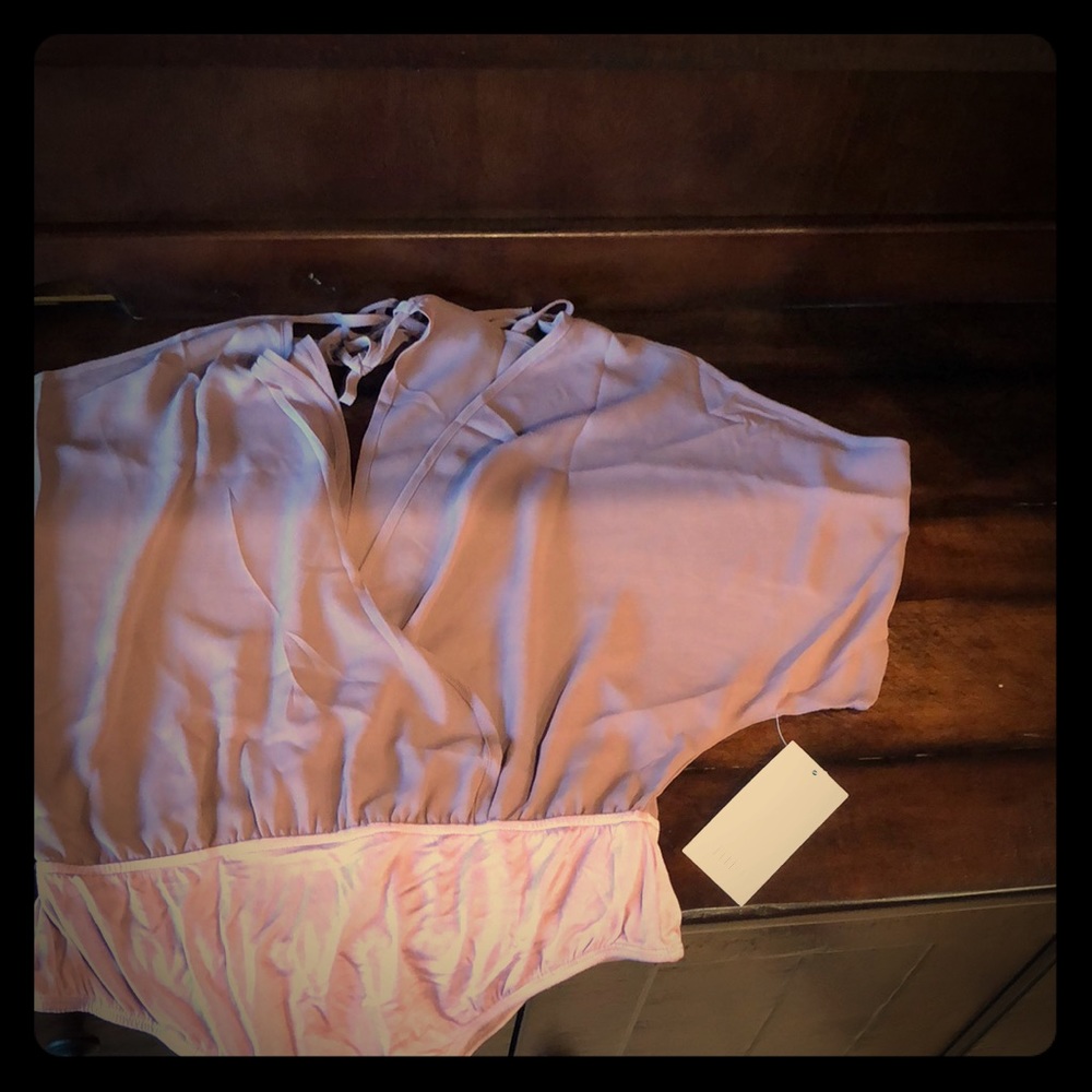 Cold shoulder body suit.
